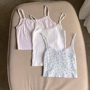 3 Brandy Melville tank tops.